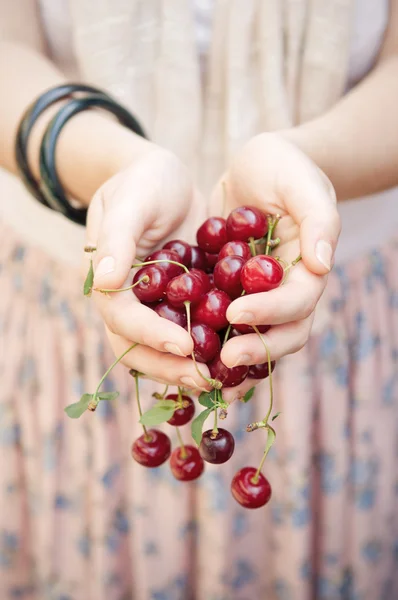 Holding cherries — Stock Photo, Image