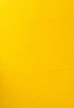 Yellow background, damaged wall, energetic colors, summer texture.