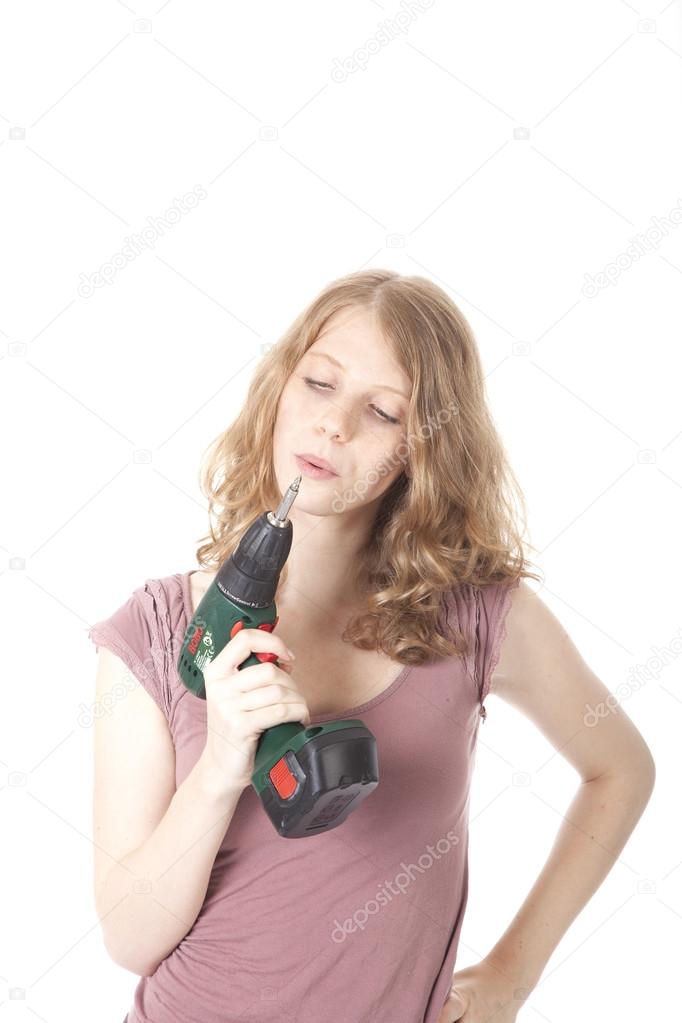 young woman with electric drill