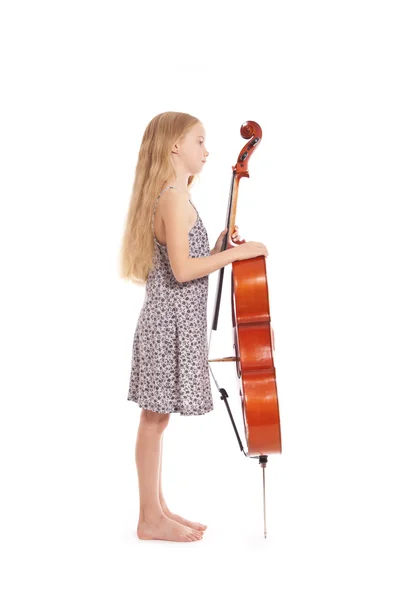 Jeune fille en robe et son violoncelle — Photo