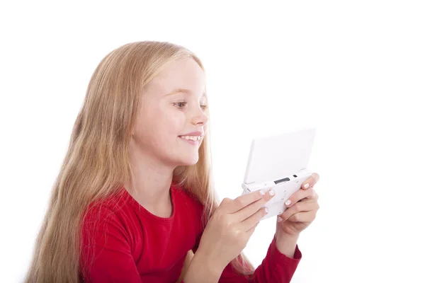 Mosolygó fiatal lány, a számítógépes játék — Stock Fotó
