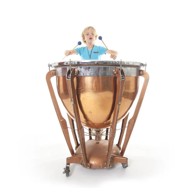 Young boy playing kettledrum — Stock Photo, Image