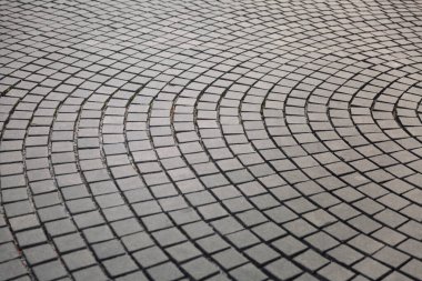 Gri kaldırımlı kaldırım taşı çizimi. Yakın plan. Geçmişi. Metin için boşluk.