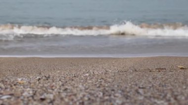 Beach background video. Beach and wavy sea 4K video.