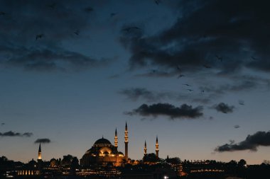 Ramadan in Istanbul background photo. Suleymaniye mosque at sunset. Ramadan or kandil or iftar or laylat al-qadr or islamic background photo. Noise effect included.