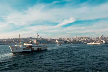 Istanbul and ferry. A ferry and cityscape of Istanbul on the background. Istanbul Turkey - 11.13.2021