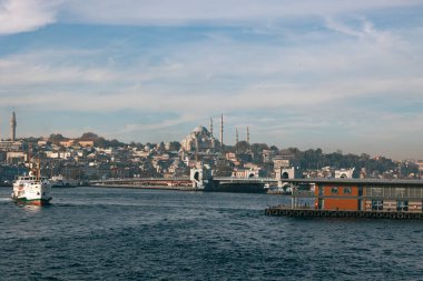 Istanbul background. Suleymaniye Mosque and ferry near the Karakoy Pier in the morning. Istanbul Turkey - 11.13.2021