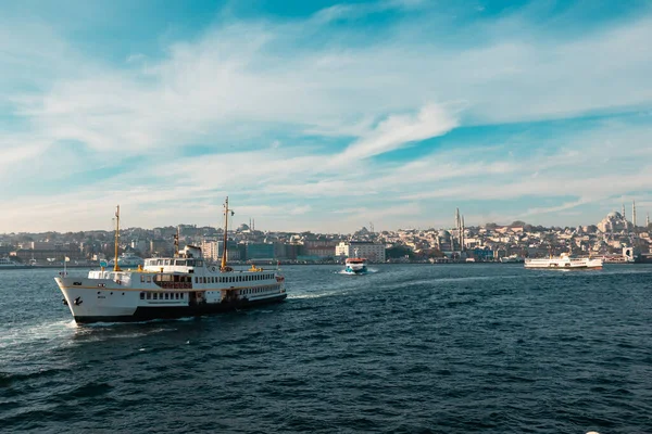 Istanbul and ferry. A ferry and cityscape of Istanbul on the background. Istanbul Turkey - 11.13.2021