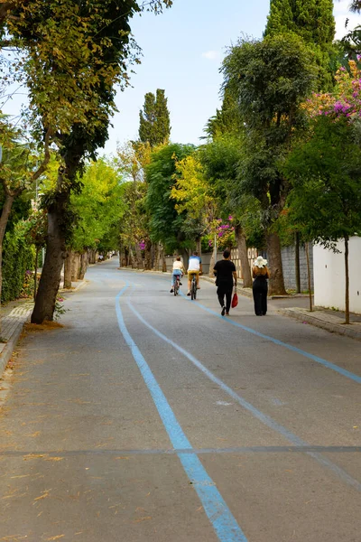 Tourists in the street of Buyukada or Adalar or Princes' Islands in Istanbul. Istanbul Turkey - 9.28.2021