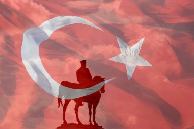 Turkish Flag with Monument of Mustafa Kemal Ataturk. Turkish National or public Holidays concept. 19th may or 19 mayis and 30th august victory day or 30 agustos zafer bayrami background.