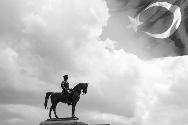 10th november memorial day of Ataturk background photo. 10 Kasim black and white concept photo with Turkish flag and statue of Ataturk.