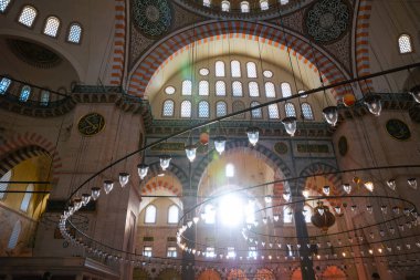 Islamic photo. Direct sunlight in the Suleymaniye Mosque. Selective focus. Istanbul Turkey - 10.29.2021