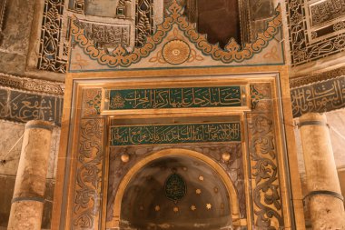 Islamic background. Calligraphies of Holy Quran on the mihrab of Hagia Sophia or Ayasofya Mosque. Istanbul Turkey - 8.12.2022