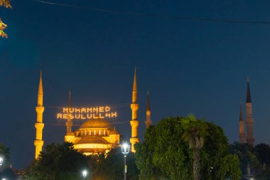 The Blue Mosque or Sultanahmet camii in Istanbul. Mohammad the messenger of Allah text between the minarets. Islamic or ramadan or kandil or kadir gecesi or laylat al-qadr background photo.