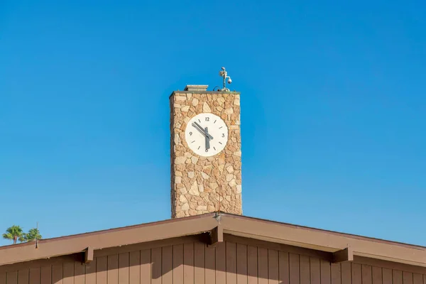 Clock tower with stones on top of a building at San Clemente, Orange County, California