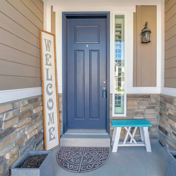 Square Gray front door exterior with lockbox on the knob and welcome signboad — Stock Photo, Image