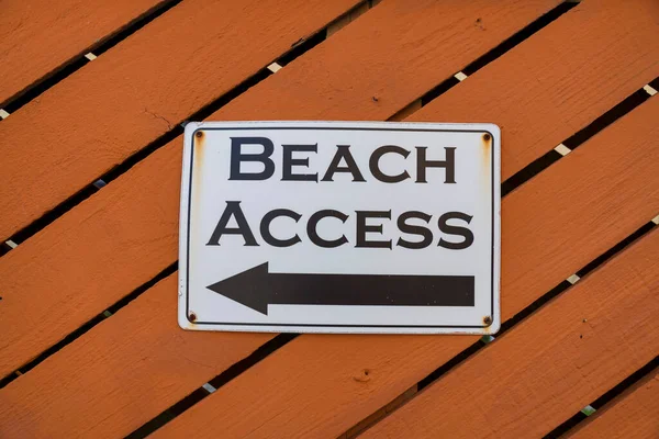 Beach Access Sign Directional Arrow Brown Wall Destin Florida Close Stock Picture