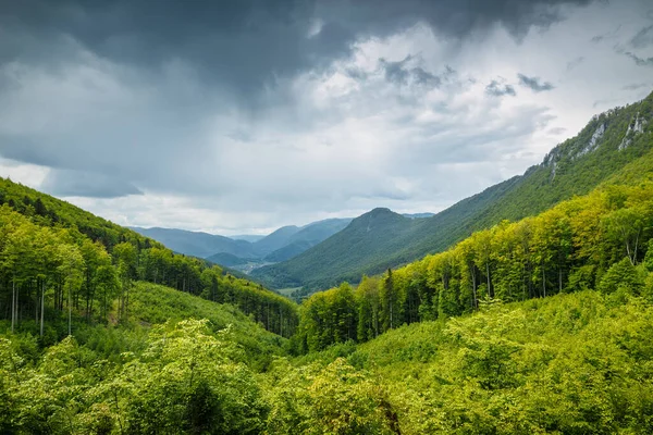 Spring cloudy landscape of hills and forests. The Muranska planina plateau national park in central Slovakia, Europe.