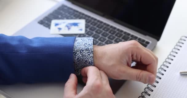 Man sitting at laptop and taking out ace playing card from his jacket sleeve 4k movie — Stock Video