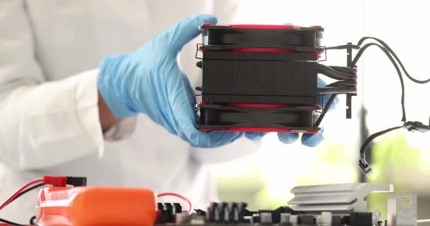 Master in rubber gloves installing cooler into computer equipment closeup 4k movie slow motion — Stock Video