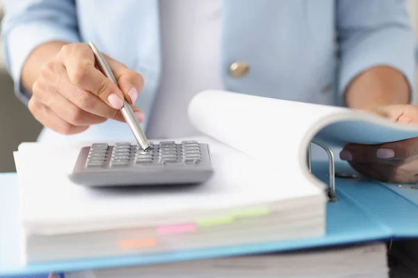 Woman accountant working on annual report on financial situation in company — Stock Photo, Image