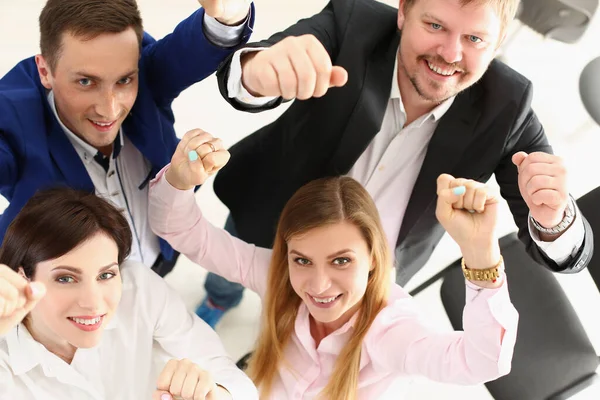 Group of people show support gesture collectively in office Royalty Free Stock Images