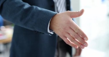 Closeup of business partners handshake in office 4k movie slow motion