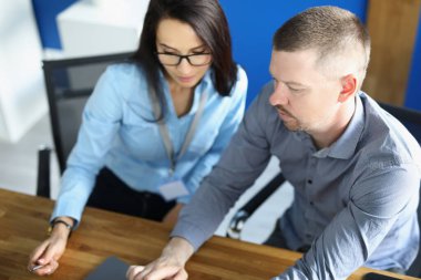 Coworkers and colleague work on new business project in office