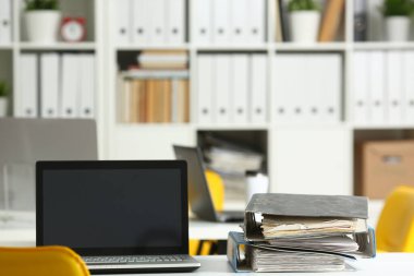 Empty workplace folders with documents in office on table closeup