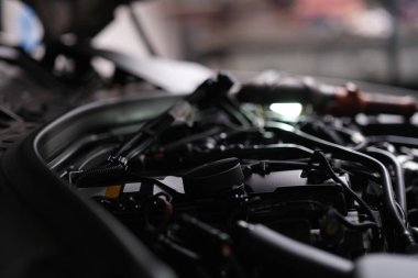 Open engine hood of a automobile, close-up