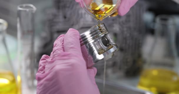 Automotive spare part oil lubrication in laboratory closeup — 비디오