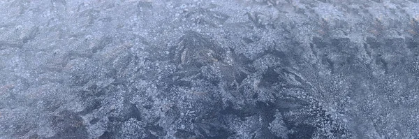 Cam arkaplanındaki buzdan güzel desen — Stok fotoğraf