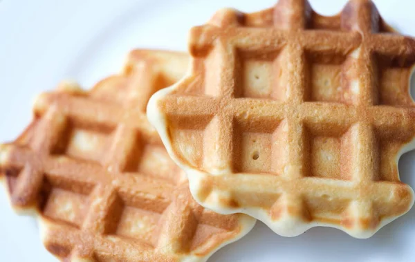 Homemade Belgian sugar waffles on plate closeup — Stock Photo, Image