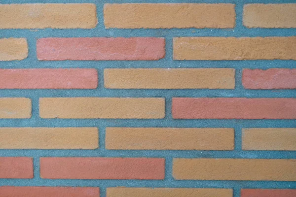 Stone wall made of rectangular bricks closeup — Stock Photo, Image