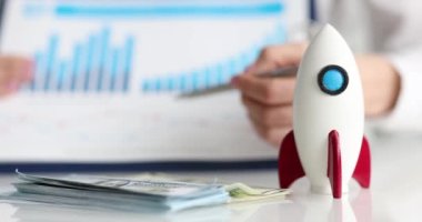 Business financial chart and rocket for startup startup