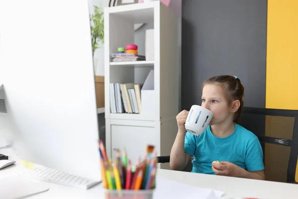 Little girl using laptop watch funny cartoons at home. —  Fotos de Stock