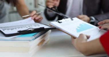 Business team is studying financial analytics in marketing