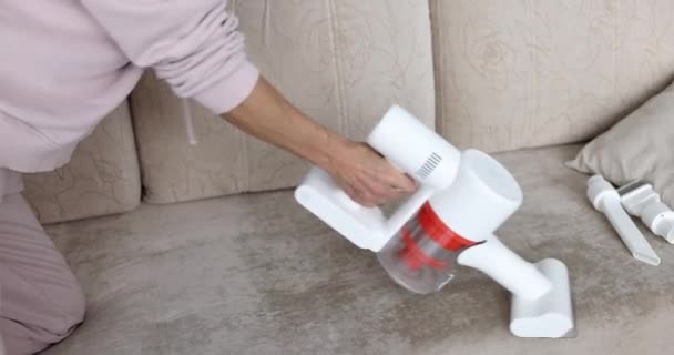 Cordless small vacuum cleaner for upholstered furniture — Stockvideo