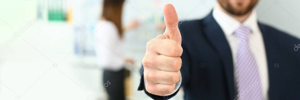 Smiling man working in office