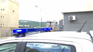 Blue flasher on police car closeup 4k movie