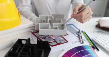 Designer showing 3d model of house project closeup 4k movie