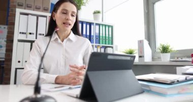 Business consultant conducts remote training for client