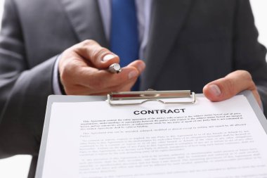Partnership agreement, realtor give contract paper with pen to sign