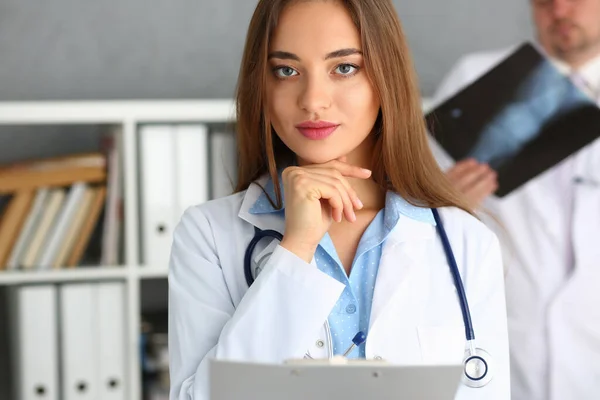 Qualified doctor in gown, young medical specialist, begin to work in clinic — Stock Fotó