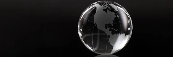 Closeup of glass globe on black background — Stock Photo, Image