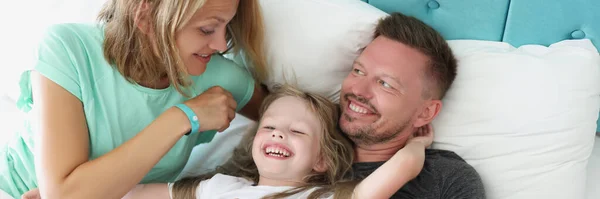 Top View Happy Family Bed Father Mother Daughter Hugging Morning — Stock Photo, Image