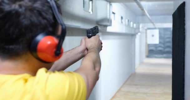 Rear View Man Aiming Gun Target Shooting Range Pistol Shooting — Stock Video