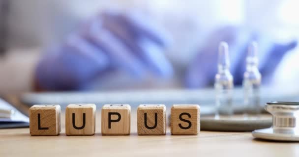 Wooden Block Word Lupus Doctor Vaccination Systemic Lupus Erythematosus Concept — Stockvideo