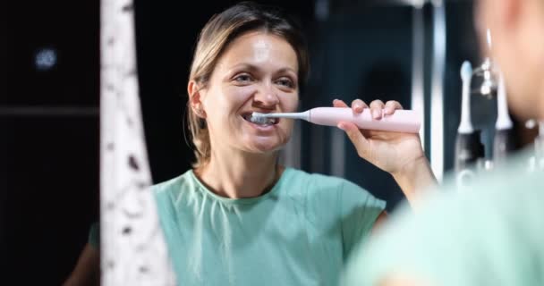 Young Beautiful Woman Brushes Teeth Electric Brush Dental Care Teeth — ストック動画