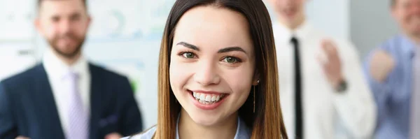 Portrait Woman Leader Present Her Team Male Workers Posing Background — kuvapankkivalokuva